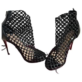Christian Louboutin Stiefeletten aus schwarzem Leder