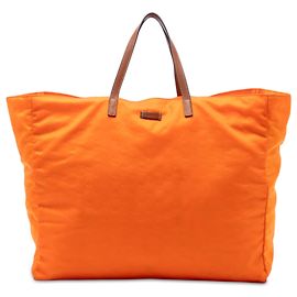 Borsa da viaggio Gucci in nylon GG arancione
