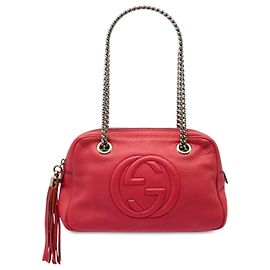 Borsa a tracolla Gucci Soho con catena e zip in pelle di vitello rossa