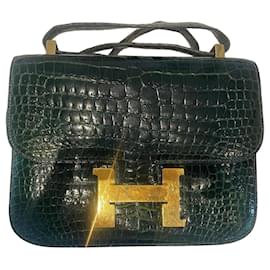 mala Hermès Constance em couro de aligátor verde