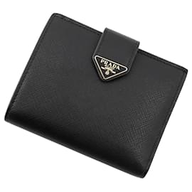 Cartera bi-fold Prada en Saffiano negro