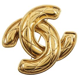 Broche Chanel Coco Mark chapado en oro