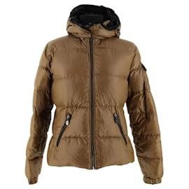 Plumífero Moncler con piel caqui