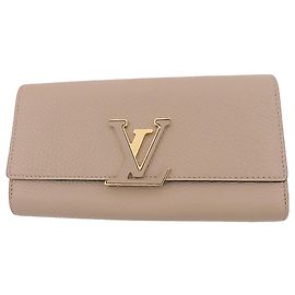 Cartera larga Louis Vuitton Capucines en cuero Taurillon beige