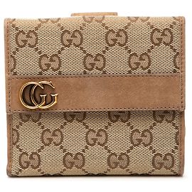 Cartera compacta trifold Gucci de lona GG beige
