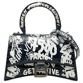 mala Hourglass Top Handle XS Balenciaga em pele de vitelo azul com relevo de crocodilo e graffiti