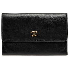 Funda de pasaporte Chanel CC en piel de becerro negra