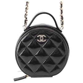 Chanel Vanity Case Round Handle With Care em pele de cordeiro vidrada matelassada preta com corrente