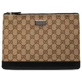Clutch Gucci in tela GG beige