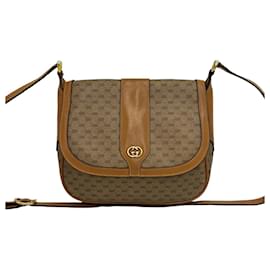 Borsa a tracolla mini Gucci in pelle marrone con motivo Micro GG Logo