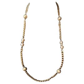 Christian Dior Collana lunga in metallo dorato e perle