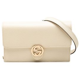 Borsa a tracolla con catena Gucci Dollar in vitello marrone con G intrecciate