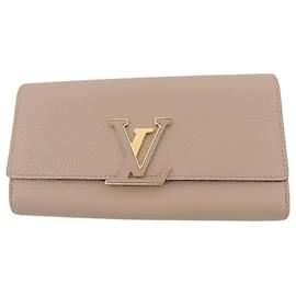 Louis Vuitton Capucines Langbrieftasche aus Taurillon-Leder in Beige