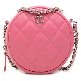 Clutch rotonda Chanel CC in pelle d'agnello matelassé rosa con catena e tracolla