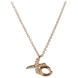 Pendente Tiffany & Co. Paloma Picasso XO in oro rosa e diamanti