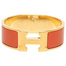 Hermès Orange Wide Enamel Clic H Bracelet PM