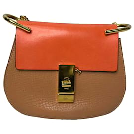 Borsa a tracolla Chloé Mini Drew con catena in pelle arancione