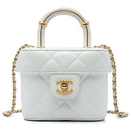 Borsa beauty Chanel Mini CC in pelle d'agnello matelassé bianca con manico superiore