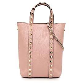 Tote Valentino Rockstud in pelle di vitello martellata rosa con catena