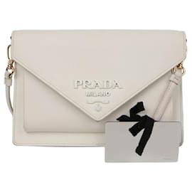Mini borsa a tracolla e pochette monocromatica - Prada