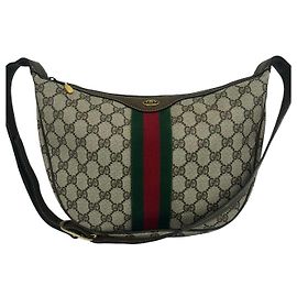 Bolso de hombro de cuero con estampado GG de Gucci