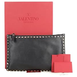 Clutch Rockstud in pelle nera - Valentino Garavani