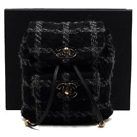 Chanel Zaino Duma in tweed di lana nero con catena in metallo dorato