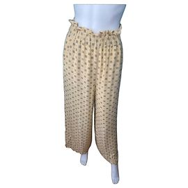 Claudie Pierlot Pantalones anchos amarillos con estampado geométrico