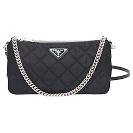 Mini borsa a tracolla in nylon nero trapuntata a diamante - Prada