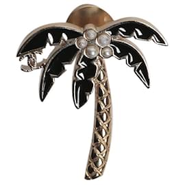 Chanel Broche de palmera dorado y negro