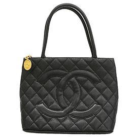 Borsa Tote Chanel in pelle di vitello martellata nera