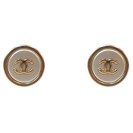 Pendientes Chanel CC redondos dorados