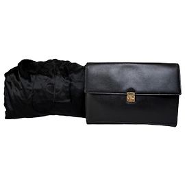 Clutch Vintage Yves Saint Laurent in Pelle Nera e Oro