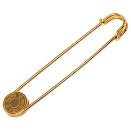 Spilla a spilla di sicurezza Clou de Selle Hermès placcata oro