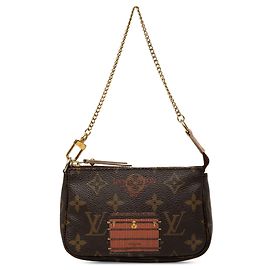 Borsa a tracolla Louis Vuitton Monogram Trunks and Locks Mini Pochette Accessoires Marrone
