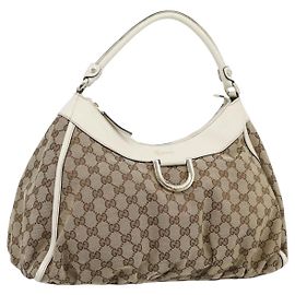 GUCCI Bolso de hombro Abbey de lona GG Beige Oro 189833