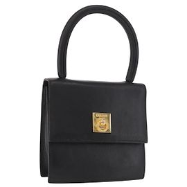 Céline Bolsa de mão CELINE em couro preto e ouro, autêntica 183388A