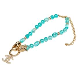 Collana Chanel CC blu con strass e perline tono oro
