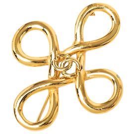 Spilla Infinito Chanel Gold CC placcata oro