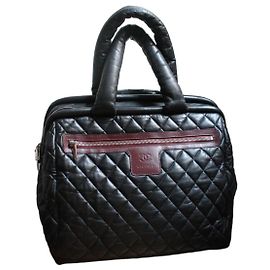 Chanel Trolley Cocoon in pelle d'agnello nera matelassé