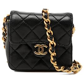 Borsa a tracolla Chanel Micro in pelle d'agnello matelassé nera con patta singola