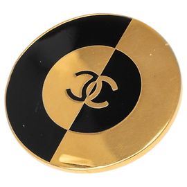 Broche Chanel Coco Mark em preto e dourado