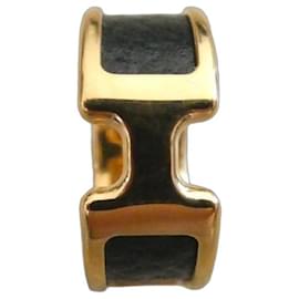 Anillo Hermès Olympe H en acero dorado y cuero negro