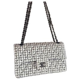 Borsa a patta Chanel Classic in tweed bianco e nero