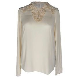 Blusa a maniche lunghe in seta bianca con dettagli in pizzo Dolce & Gabbana