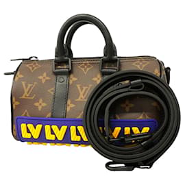 Borsa a mano Louis Vuitton Monogram LV Rubber Keepall XS
