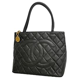 Borsa Tote Chanel in pelle di vitello martellata nera