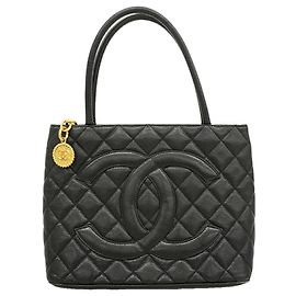 Borsa Tote Chanel in pelle di vitello martellata nera