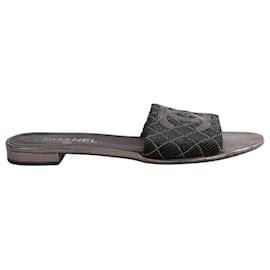 Mules Chanel in pelle nera