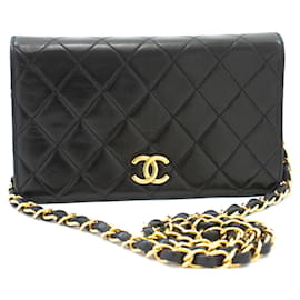 Chanel Vintage Mini in pelle d'agnello matelassé con patta completa